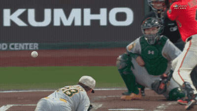 Baseball Game In Front Of Kumho Advertisement GIF