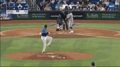 Baseball Game In Front Of Loanche Bank Ad GIF