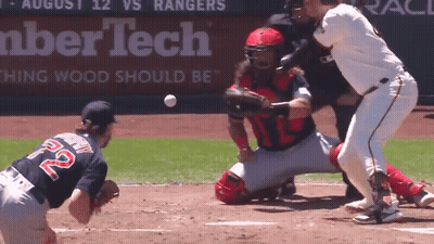 Baseball Game In Front Of Lumbertech Sign GIF