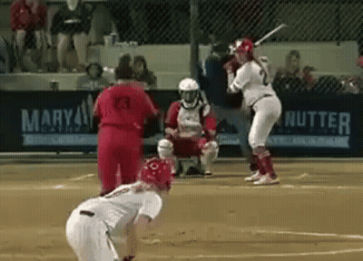 Baseball Game In Front Of Mary Nutter Banner GIF
