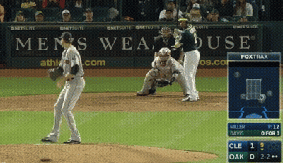 Baseball Game In Front Of Men's Wearhouse Ad GIF