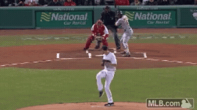Baseball Game In Front Of National Advertisement GIF