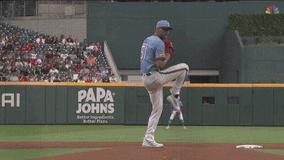 Baseball Game In Front Of Papa Johns Ad GIF