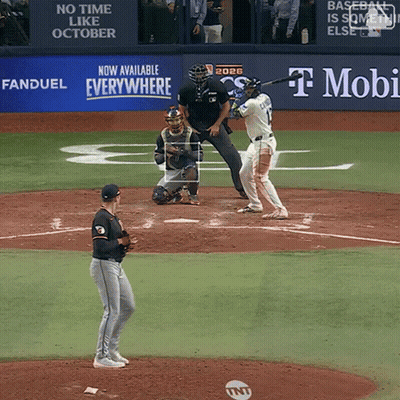 Baseball Game In Front Of T-Mobile Banner GIF