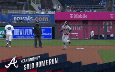 Baseball Game In Front Of T-Mobile Banner GIF