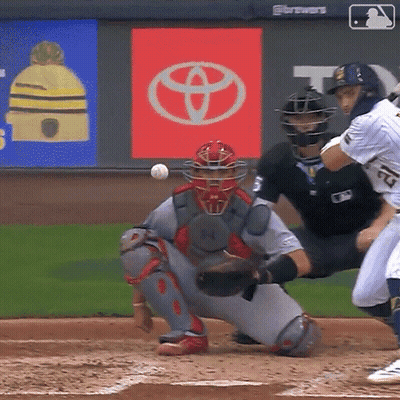 Baseball Game In Front Of Toyota Ads GIF