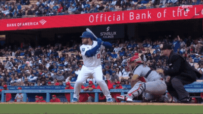 Baseball Player Batting With Bank Of America Banner GIF