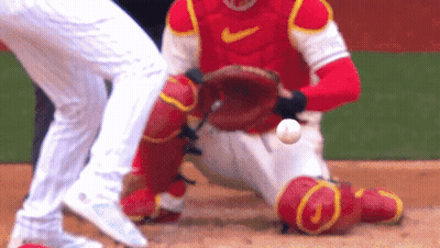 Baseball Player Catching Ball In Red Nike Jersey GIF