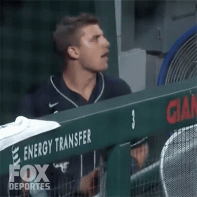 Baseball Player Covering Face Behind Fox Deportes GIF
