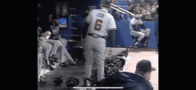 Baseball Player Cox Standing In Dugout GIF