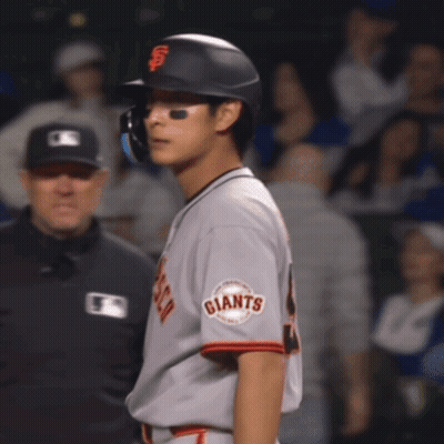 Baseball Player For Giants Standing In Front Of Referee GIF