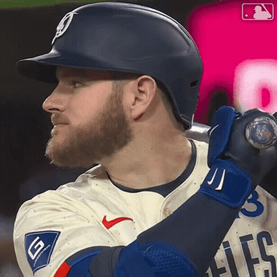 Baseball Player Holding Bat Number 3 GIF