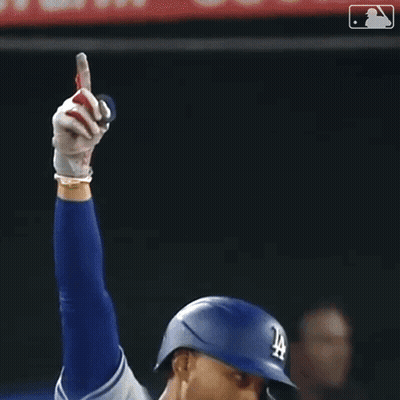 Baseball Player Holding Glove In Dodgers Helmet GIF
