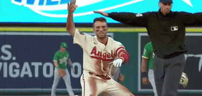 Baseball Player In Angels Uniform Being Chased GIF