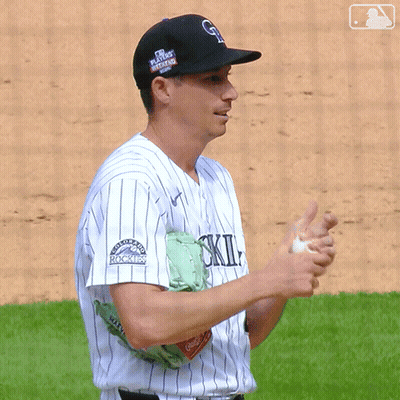 Baseball Player In Black Rockies Hat GIF