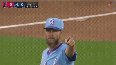 Baseball Player in Blue Atlanta Jersey