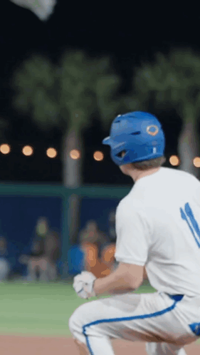 Baseball Player In Blue Helmet Number 11 GIF