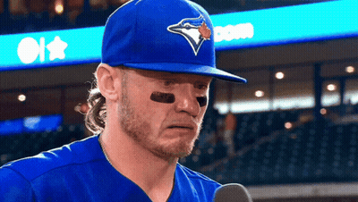 Baseball Player In Blue Jays Hat Talking Into Microphone GIF