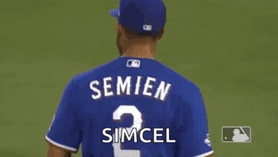 Baseball Player In Blue Jersey Number 2 GIF
