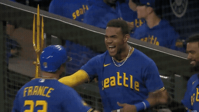 Baseball Player In Blue Jersey Number 23 GIF