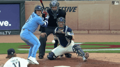 Baseball Player In Blue Jersey Number 9 GIF