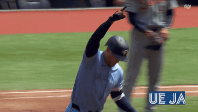 Baseball Player In Blue Jersey With Toronto GIF