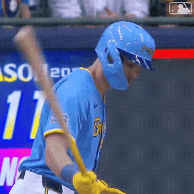 Baseball Player In Blue Uniform Swinging Bat GIF
