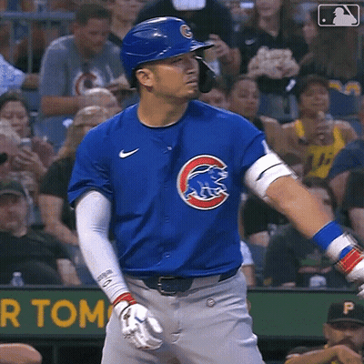 Baseball Player In Blue Uniform With Cubs Logo GIF