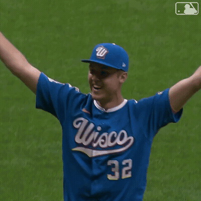 Baseball Player In Blue Wisconsin Jersey GIF