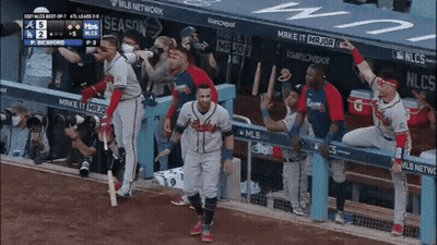 Baseball Player In Braves Uniform Walking On Field GIF