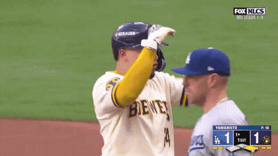 Baseball Player in Brewers Jersey Talking to Another