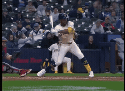 Baseball Player In Brewers Uniform Swinging At Pitch GIF