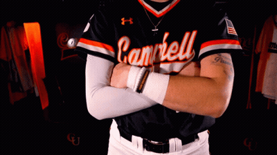 Baseball Player in Cambell Jersey Arms Crossed