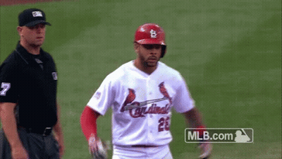 Baseball Player In Cardinals Uniform Standing On Field GIF