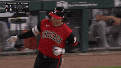 Baseball Player in Chicago Jersey Running