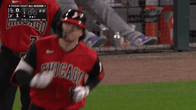 Baseball Player in Chicago Jersey Running