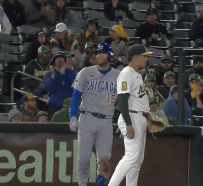 Baseball Player In Chicago Jersey Talking To Another Player GIF