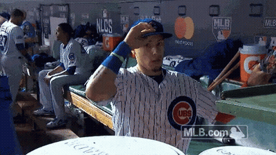 Baseball Player In Cubs Uniform Adjusting Hat GIF