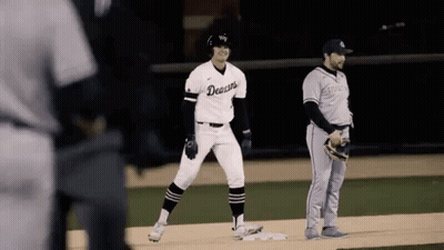 Baseball Player In Denison Jersey On Base GIF