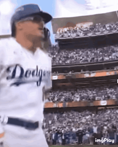Baseball Player in Dodgers Jersey Before Crowd