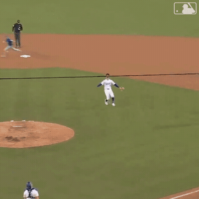 Baseball Player In Dodgers Jersey Catching Ball GIF