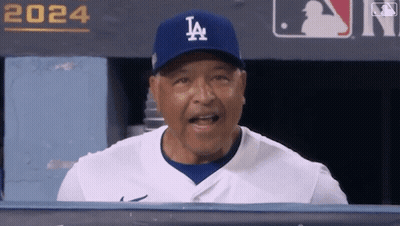 Baseball Player In Dugout With Bank Of America Sign GIF