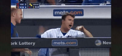 Baseball Player In Dugout With Mets Advertisement GIF