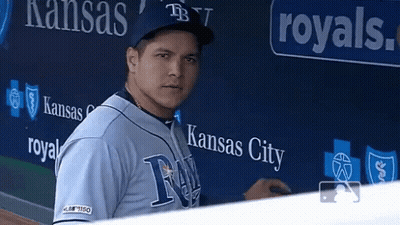 Baseball Player In Front Of Kansas City Wall GIF