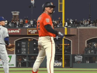Baseball Player In Front Of Levi's Sign GIF