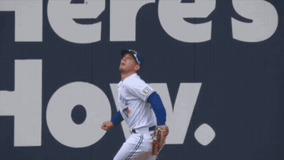 Baseball Player In Front Of Wall Saying Where's How GIF