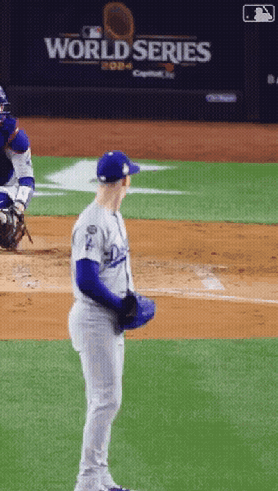 Baseball Player In Front Of World Series Wall GIF