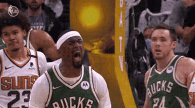 Baseball Player In Green And White Uniform With X On Cap GIF