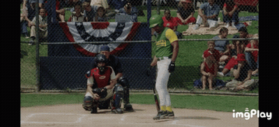 Baseball Player in Green and Yellow Jersey Number 33
