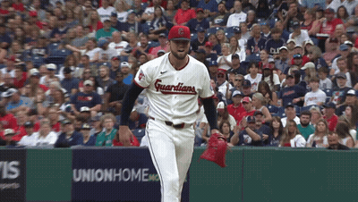 Baseball Player In Guardians Jersey In Front Of Union Home Sign GIF